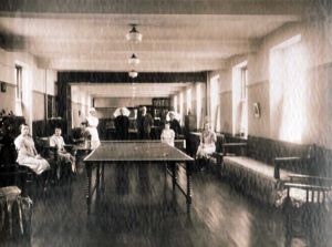 Westwood Hospital – Female Ward 1 1930s. L-R Charge Nurse, Matsre, Matron, Sister J walker and 5 female patients..
